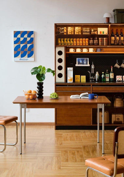 Modern interior with wooden furniture, a bar area, and decorative elements.